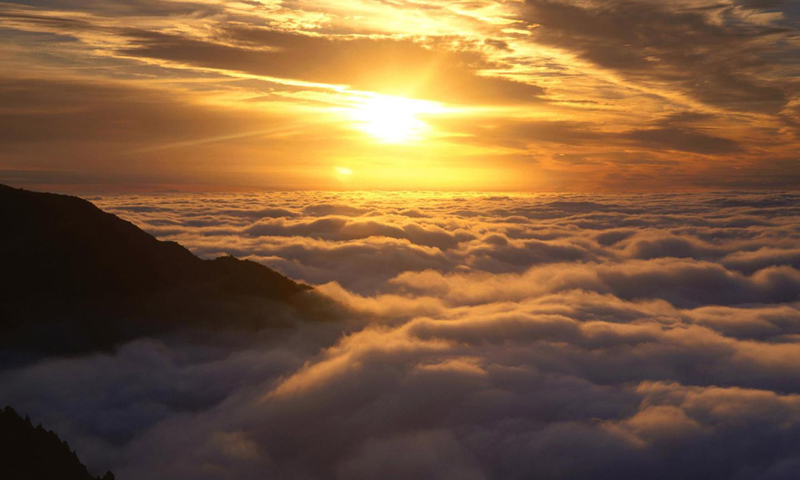 SunOverClouds.jpg